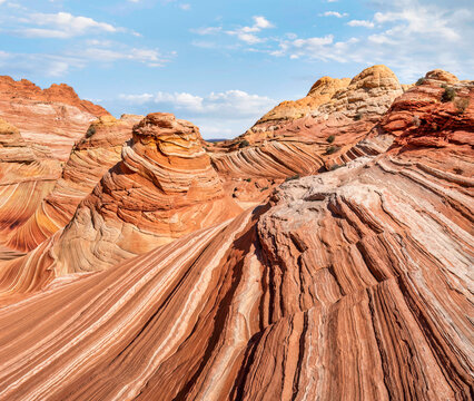 Amazing rock formations of The Wave - Coyote Buttes North area of the Paria Canyon - Vermilion Cliffs Wilderness on the Arizona and Utah border