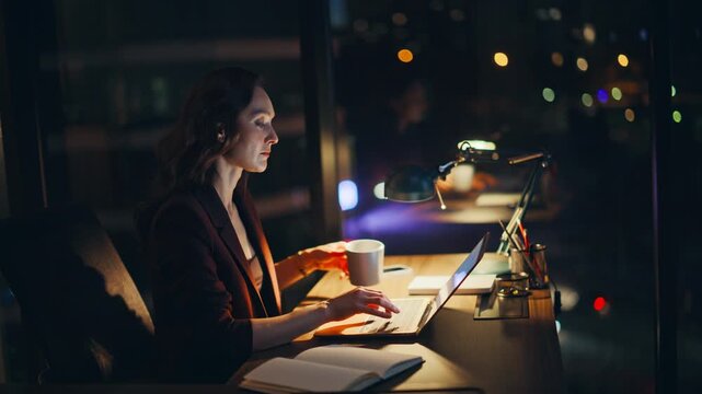 Thoughtful businesswoman pondering laptop evening office. Late worker thinking