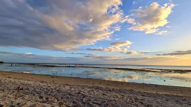 Public Tropical Beach At Padre Burgos At Sunset In Southern Leyte, Philippines. Panning Shot