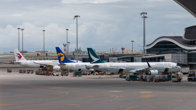 Airplanes waiting at gate in hong kong international airport