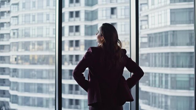 Business owner contemplating city view office workplace. Leader in suit thinking