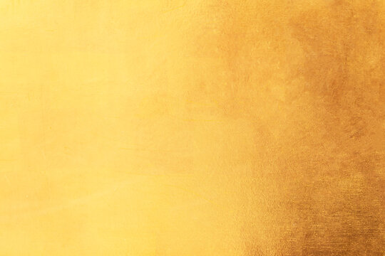 Gold metal background or texture  and gradients shadow horizontal shape, copy space (High resolution), real photo