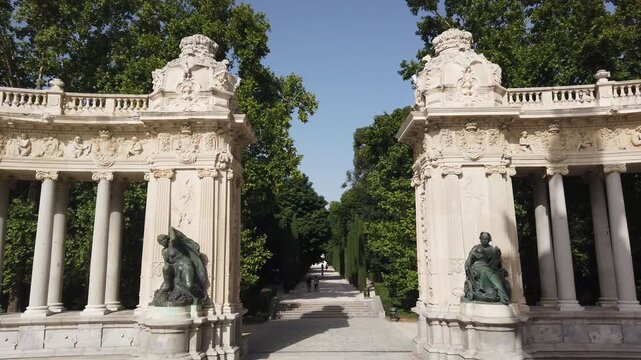Handheld of Retiro Park Alfonso XII Monument Madrid Spain Colonnade Architecture and Promenade Path