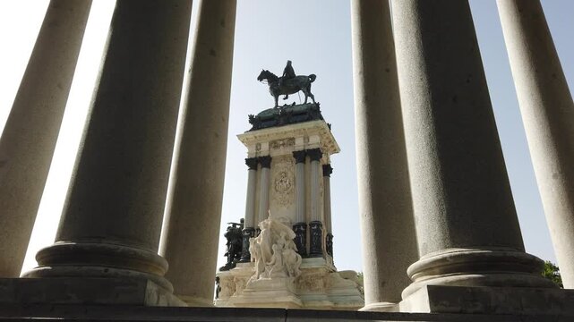 Retiro Park Alfonso XII Monument Equestrian Statue Framed by Columns Madrid Spain Low Angle View