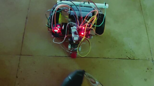 Arduino Obstacle Avoiding Robot Car Moving On Floor Indoor