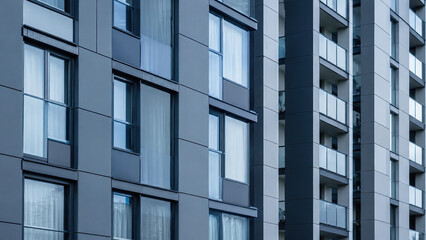 Obraz premium Modern apartment building facade with balconies