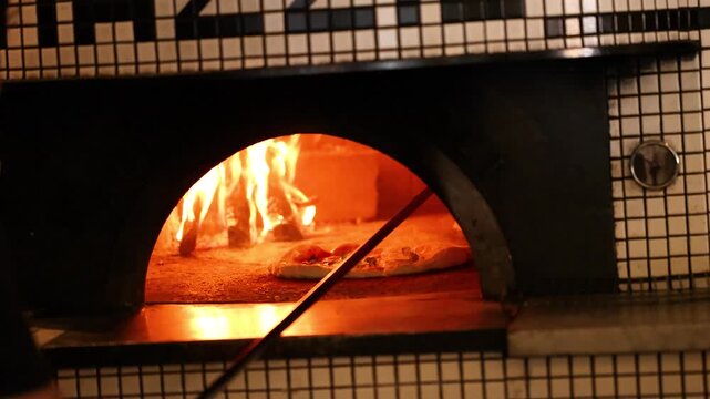 Traditional Wood Fired Pizza Baking in a Stone Oven
