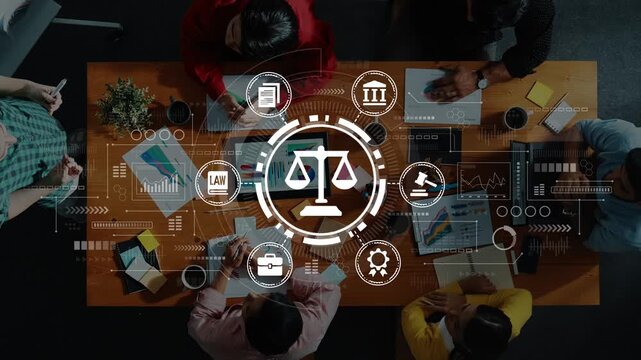 Aerial View of Diverse Team Collaborating on Legal Strategies and Analytics in Modern Office with Symbols of Justice and Technology Overlay. Entropy.