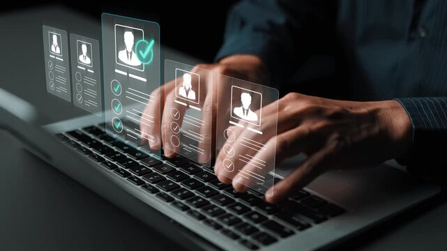Hands typing on laptop keyboard with digital interface showing profiles and checkmarks representing online selection or verification process in modern work setting Sigmoid