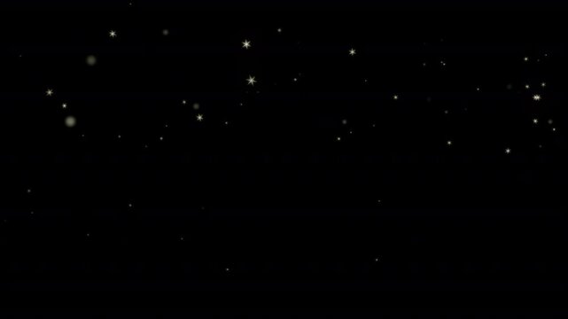 Golden bokeh particles scatter across the dark black empty space as light.