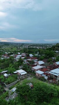 Cinematic Drone Flyover of Hillside Housing Estate in Sumbawa Indonesia