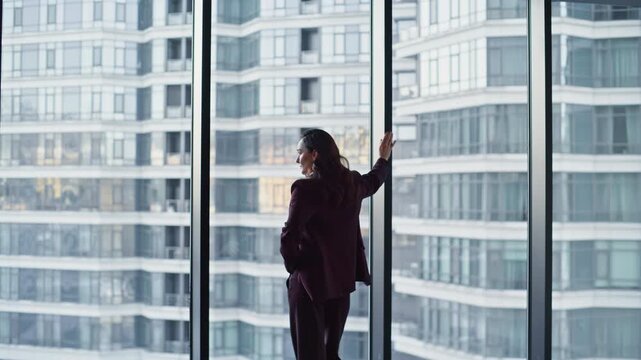 Corporate leader watching skyline reflecting ambitions day moment in workplace