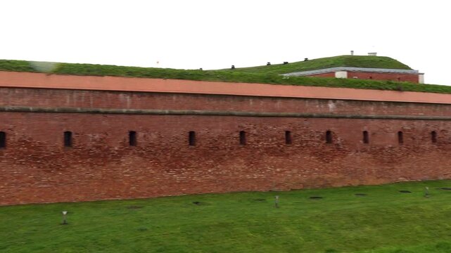ZAMOSC, POLAND - OCTOBER 30 2017: Red brick wall around the Old Town.