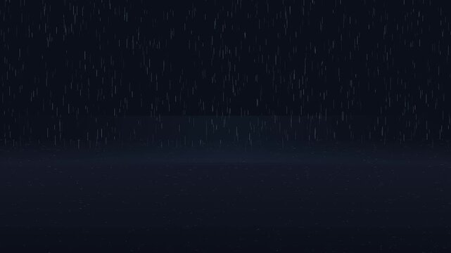Heavy rain falling on a dark blue background at night