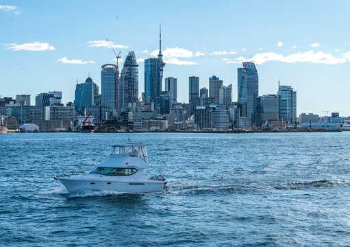 Auckland skyline and Sky Tower seen from the harbour, amid the city's ongoing construction boom, Auckland, New Zealand, November 2025.