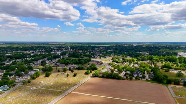 Cemetery by farmland Milford Delaware USA aerial drone footage
