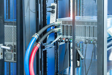 Fototapeta premium server racks with a liquid cooled supercomputer system with tube 