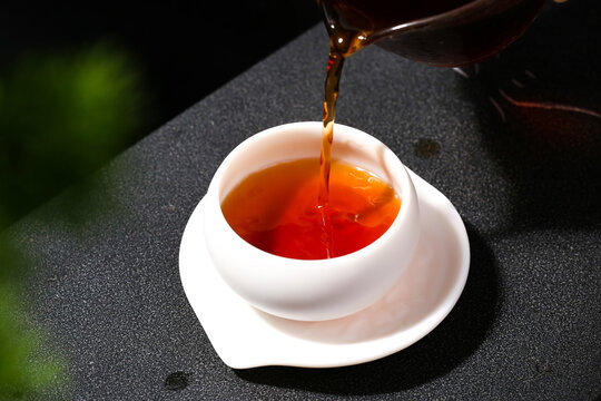 Amber Black Tea in Ceramic Teacup Chinese Tea Still Life