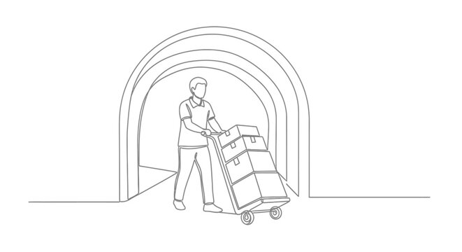 Worker pushing cart with stacked boxes in warehouse.