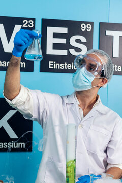 Vertical Scientist Caucasian man hand writing note research medical lab look at science medical test. Scientist Caucasian chemistry Vertical horizon male technician laboratory scientific experiment