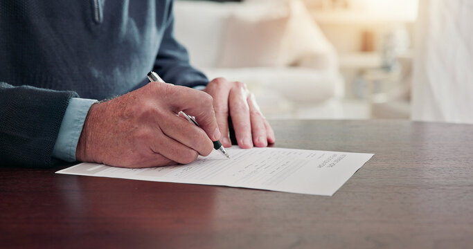 Senior, hands or sign documents at table for admission policy, consent or form for retirement home. Pensioner, man and signature in house for assisted care agreement, tenancy application and details