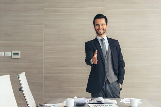 Portrait caucasian man businessman smiling face confident leader manager in meeting rooom office desk. Caucasian handsome man success look away thinking poses. Happy positive Handsome CEO