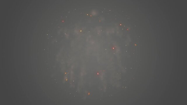 Fireworks dissipate in the dark night sky, leaving behind faint trails of smoldering embers and smoke that suggest the fading aftermath of a grand pyrotechnic celebration.