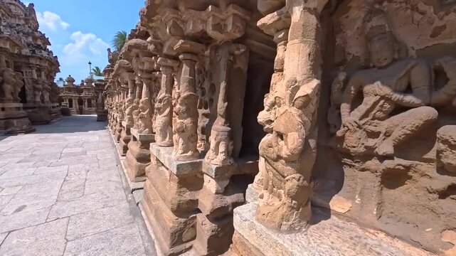 Movement along the sculptures in the ancient temple of Lord Shiva in Sri Rangam