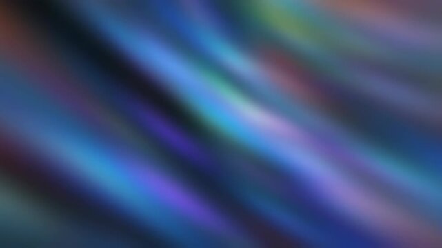 Holographic foil background with rainbow colors.