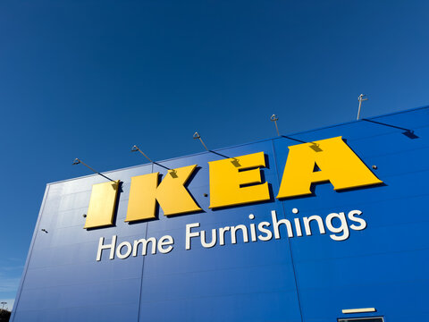ADELAIDE AUSTRALIA - MARCH 8 2025: Famous IKEA logo on big blue store with large yellow lettering against a blue sky.