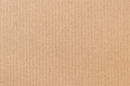 Brown cardboard sheet abstract background, texture of recycle paper box in old vintage pattern for design art work.