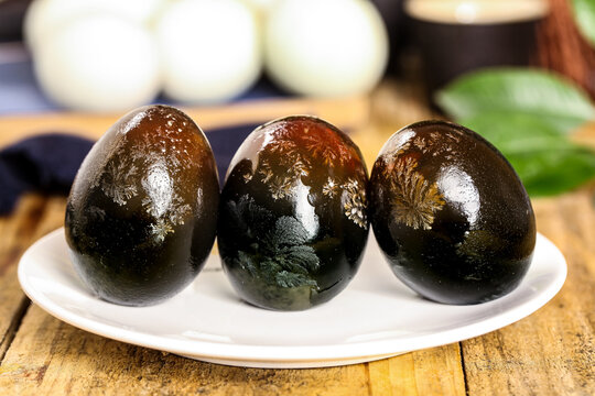 Century Eggs Traditional Chinese Preserved Food Delicacy on White Plate Studio Photography
