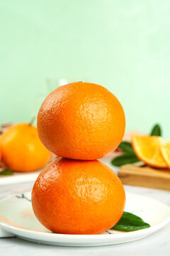 Fresh Orange Citrus Fruits on White Plate