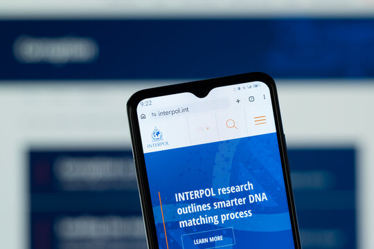 Dhaka, Bangladesh - 05 May 2026: Close-up of INTERPOL homepage on a smartphone.