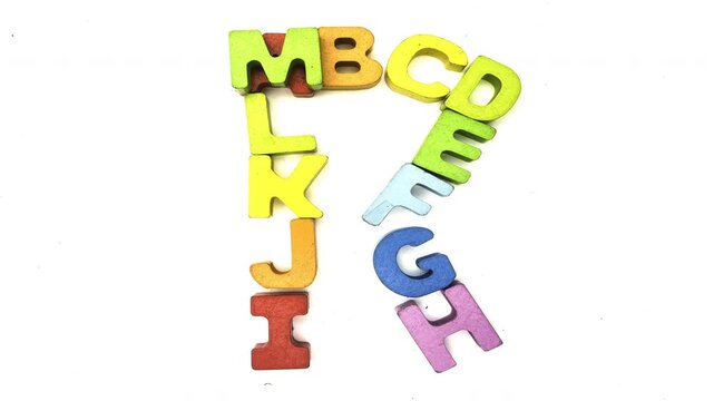 The alphabet makes the letter R with color wooden letters stop motion 