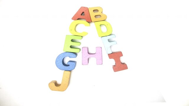 The Alphabet makes the letter A with wooden letters stop motion 