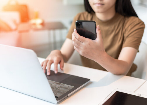 Digital lifestyle blog writer or business person work anywhere using smart device working on mobile smartphone and computer laptop via internet communication network technology e-commerce marketing