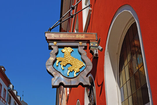 Heidelberg, Germany - June 2024: Sign of historic restaurant called 'Zum G&uuml;ldenen Schaf' in city center