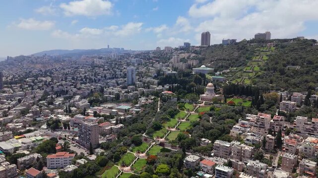 Wide Aerial Pull Back Shot of Bahai Gardens and Haifa Cityscape in Israel