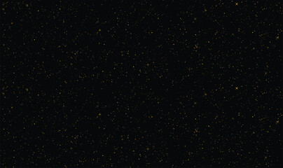 Fototapeta premium Black background with scattered shiny golden glitter and star shapes.