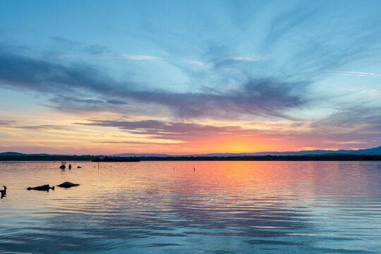 Landscape with the Valpara&iacute;so Reservoir at sunset with blue and orange colors, Zamora, Castile and Le&oacute;n, Spain.
