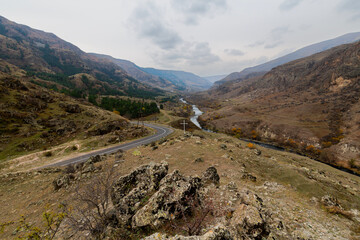 Autumn landscape of river in the Caucasus mountains of Georgia © Pavel