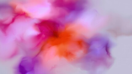 Fototapeta premium Colors blend together in abstract form during a creative art session in a studio on a bright afternoon