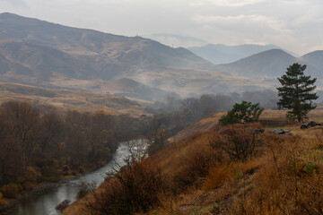 Autumn landscape of river in the Caucasus mountains of Georgia © Pavel
