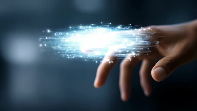 This image captures the concept of digital transformation and innovation, where a hand connects with glowing data lines. The scene represents modern technology, connectivity, and virtual interaction