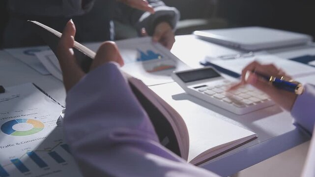 Business accounting concept, Business man using calculator with computer laptop, budget and loan paper in office.