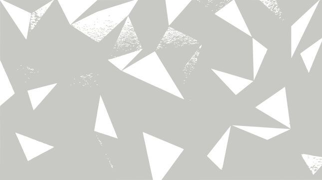 Abstract geometric pattern of white triangles on a gray background, minimalist design