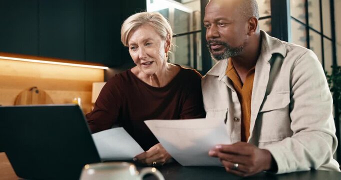Budget, documents and laptop with interracial couple on sofa in home living room for planning. Computer, paperwork and pointing with mature people in apartment for financial discussion or review
