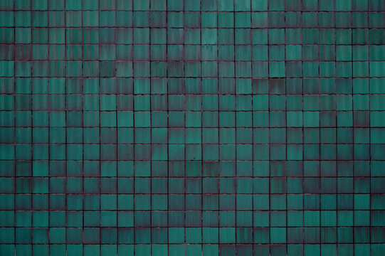 T&uuml;rkise Wand mit Kacheln als Hintergrund