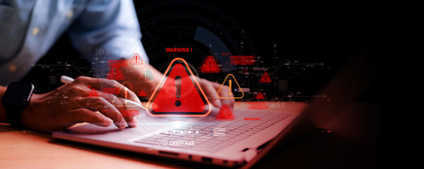 Obraz premium Computer user facing cyber attack warning alerts on laptop, deepfake fraud detection, virus infection notification, cybersecurity system failure.